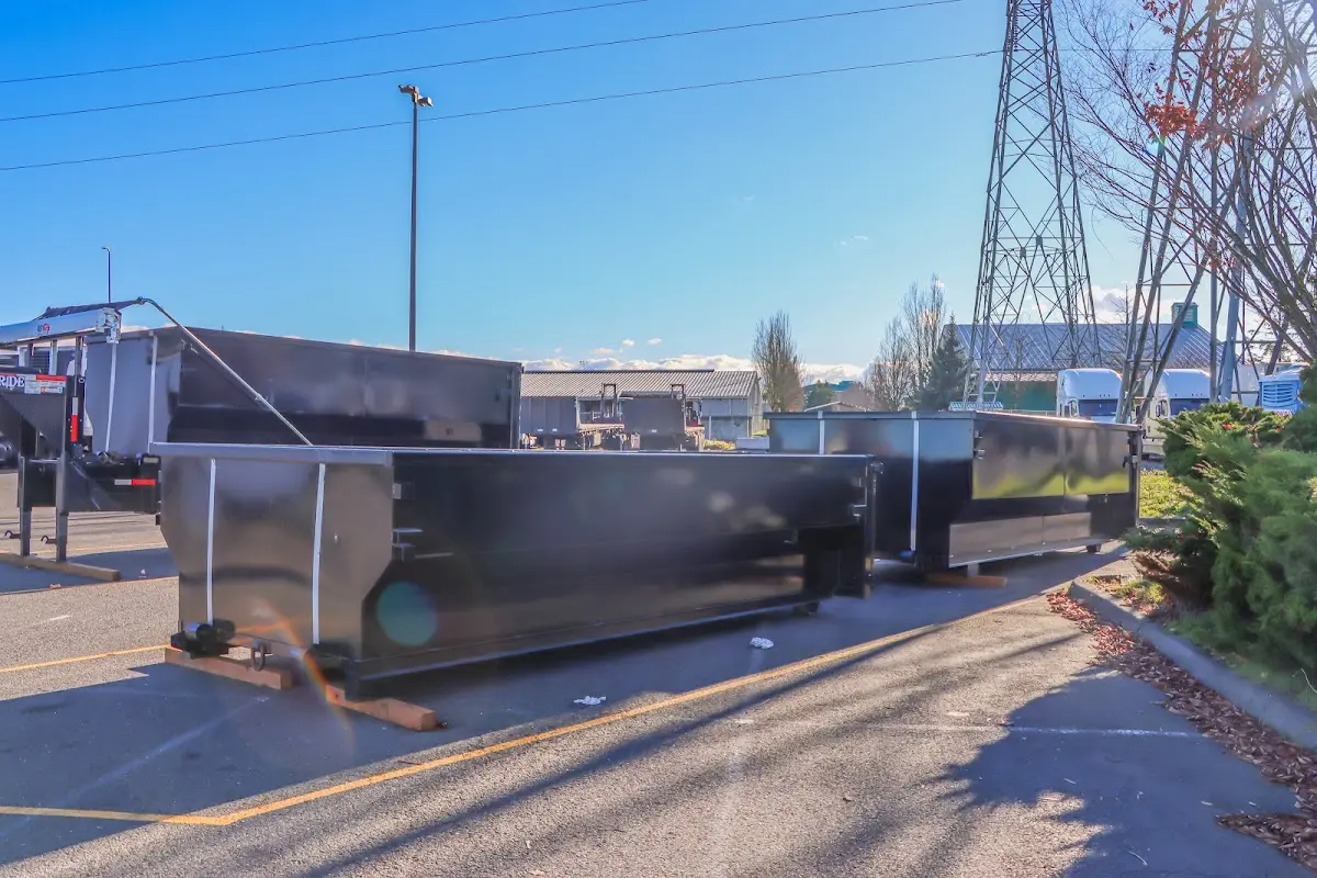 Roll-off dumpster ready for waste disposal at job site for 12 Yard Dumpster Rental in Byram